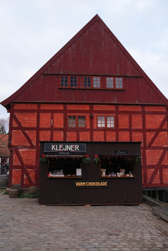 Hot chocolate stand outside a red half-timbered building