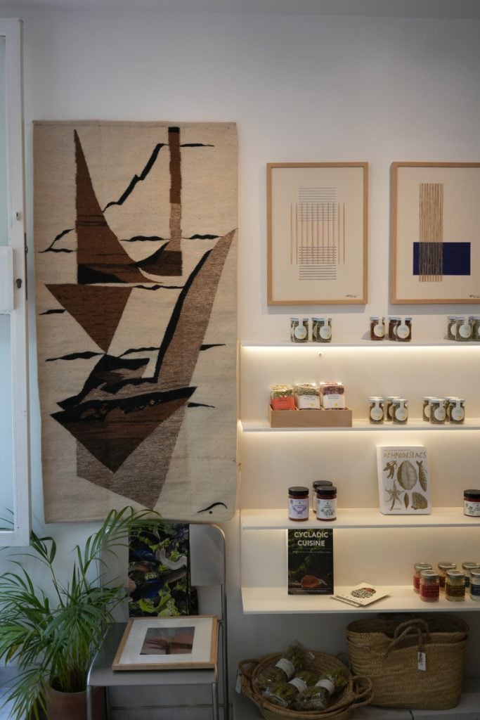 Textile art and pantry goods inside ERE Athens