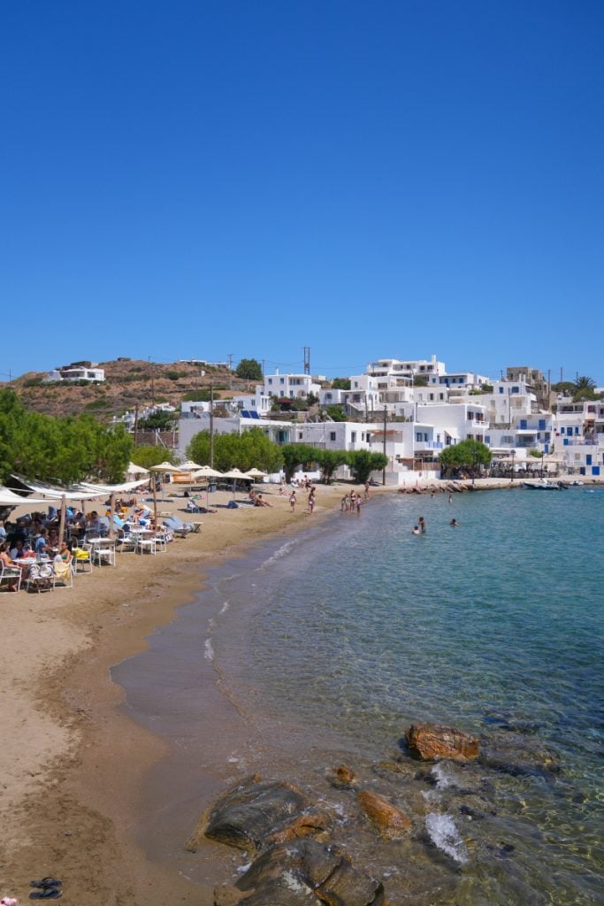 Beachfront cafés and whitewashed buildings at Faros Beach