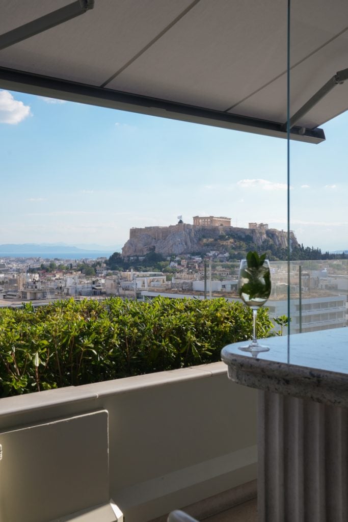 Cocktail overlooking the Acropolis from GB Roof Garden