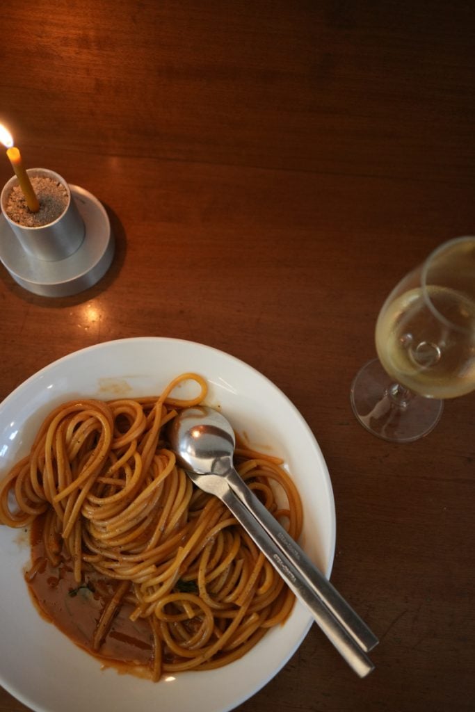 Pasta and white wine at LS&SIA in Athens