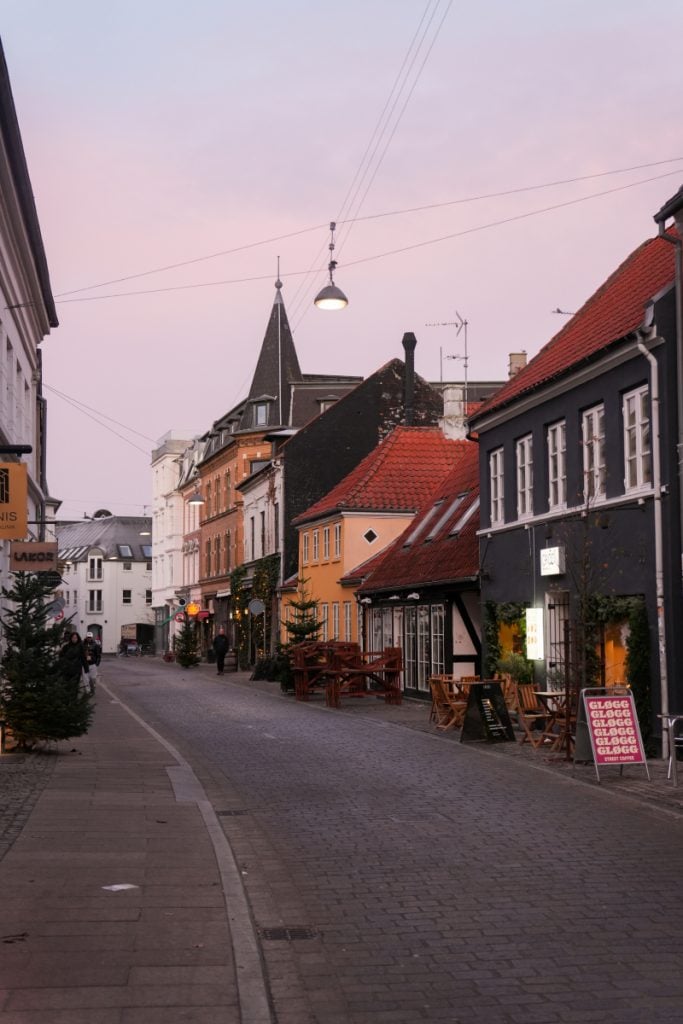Cobbled street with cafés in Aarhus’s Latin Quarter
