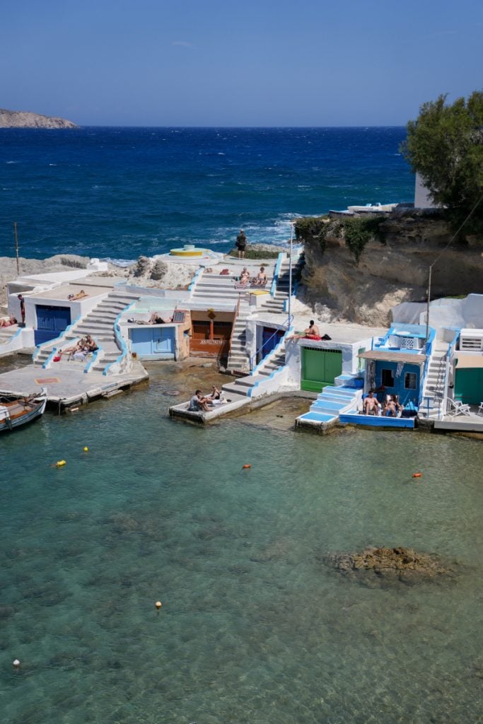 Colorful boathouses lining Mandrakia's sheltered cove