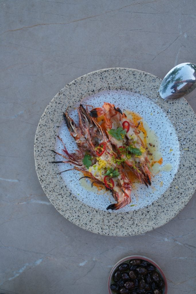 Grilled prawns with herbs and sliced chiles
