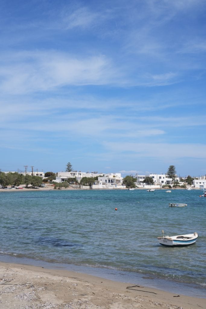 Small boat anchored off Pollonia Beach