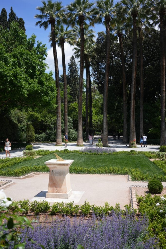 Sundial and palm trees in Athens’ National Garden