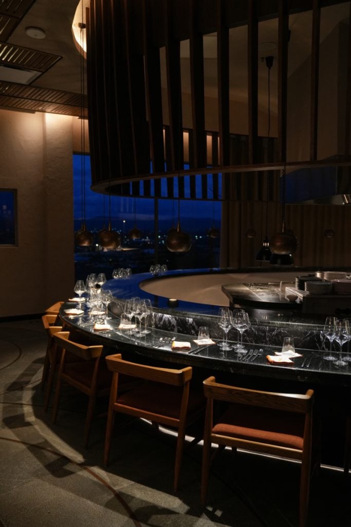 Open kitchen counter seating at Amapola