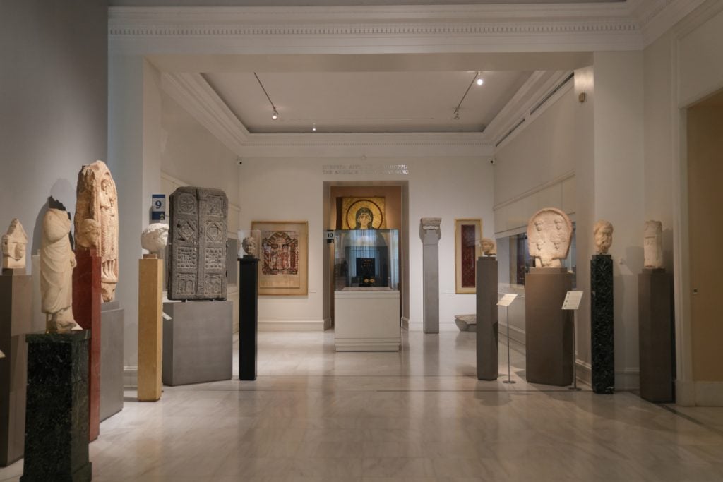 Benaki Museum gallery with icons and stone artifacts
