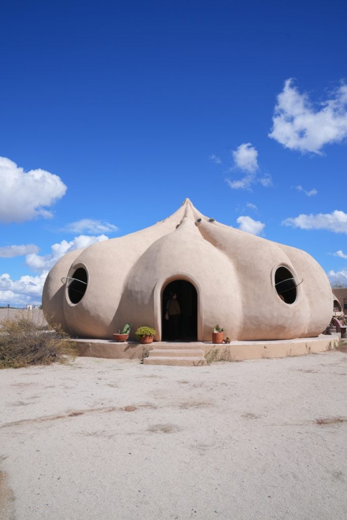 Sculptural building with round windows at Bloodlust