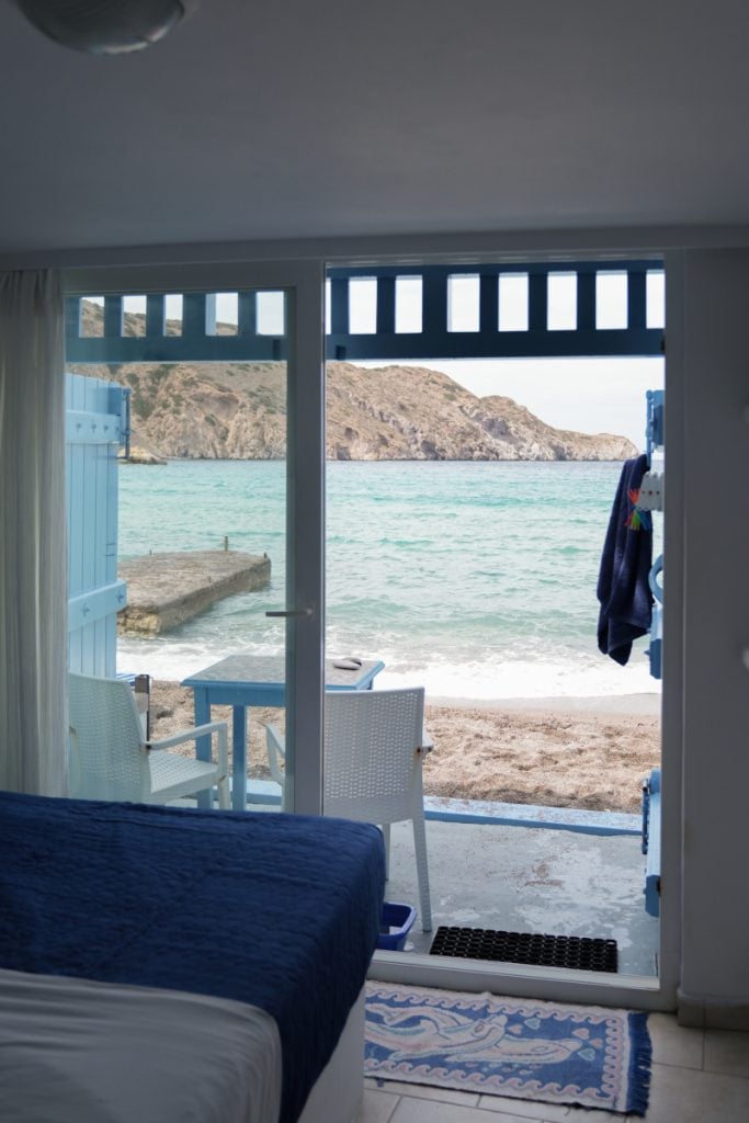 Boathouse bedroom opening directly onto Firopotamos Beach