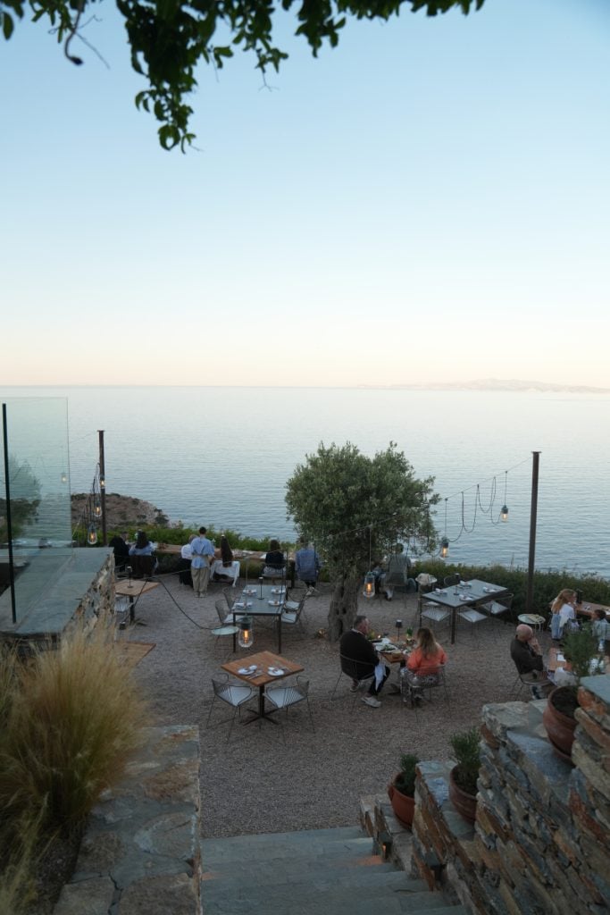 Bostani terrace overlooking the Aegean Sea at dusk