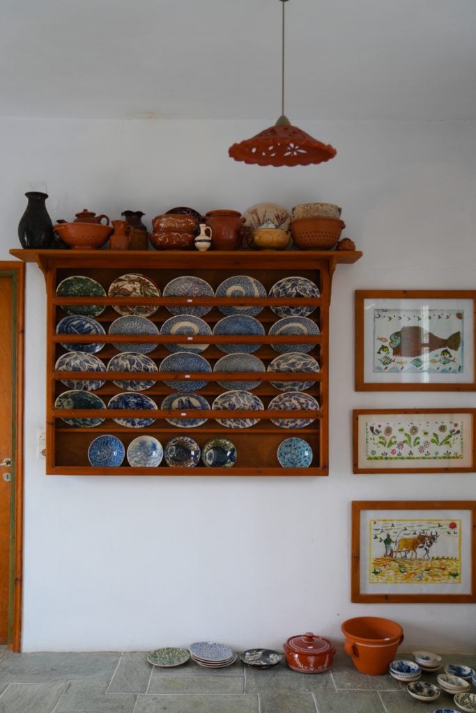 Hand-painted ceramic plates displayed at Lembesis Ceramics