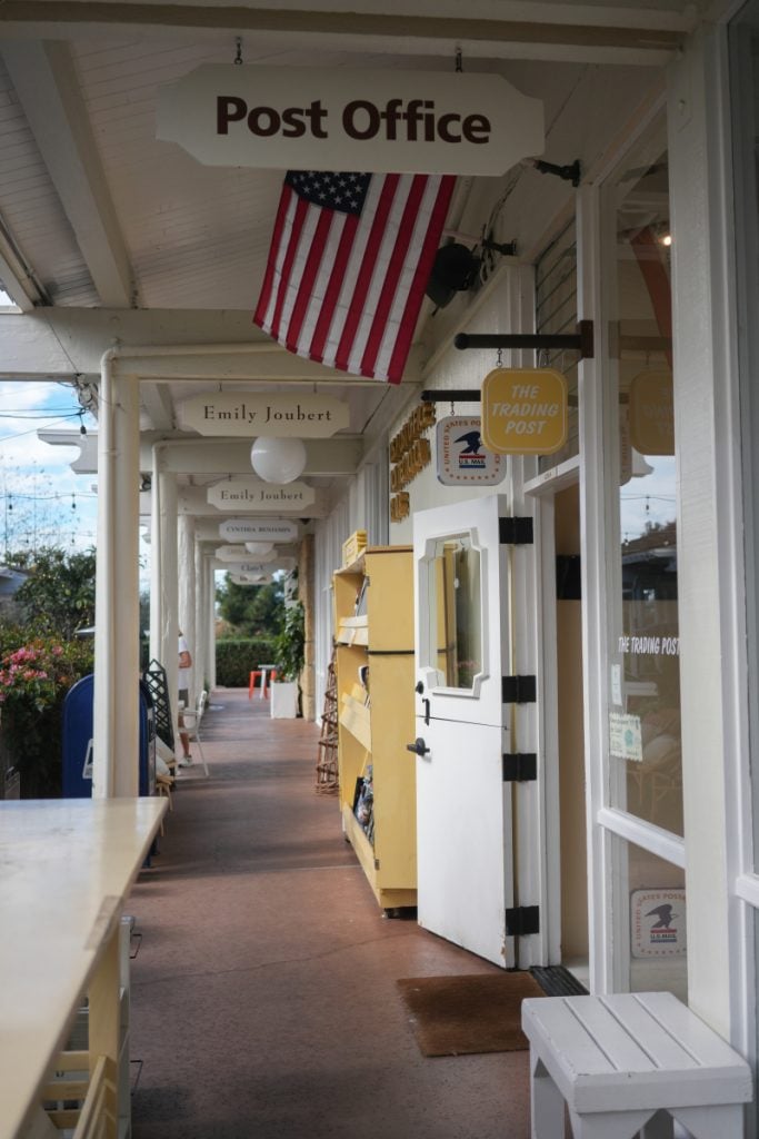 Covered walkway and Post Office sign at Montecito Country Mart