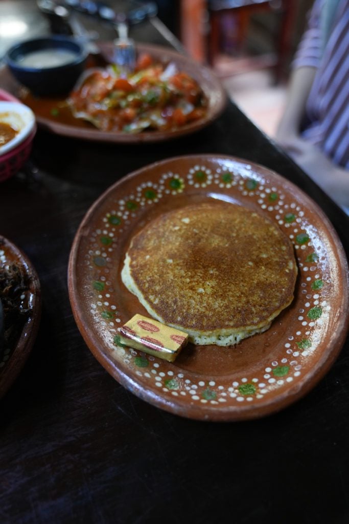 Elote pancake with butter at La Cocina de Doña Esthela