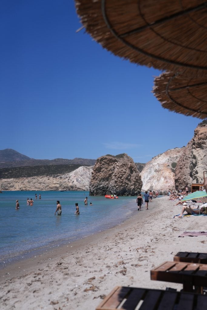 Swimmers and sunbathers at Firiplaka Beach