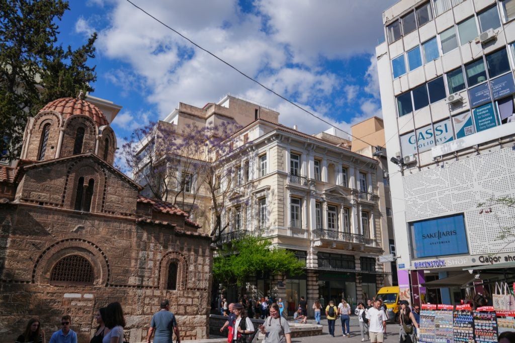 Historic church and shops in Athens' Monastiraki neighborhood