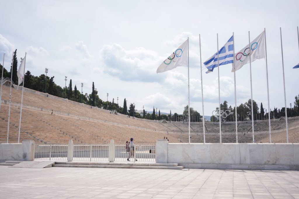 Olympic and Greek flags inside Panathenaic Stadium