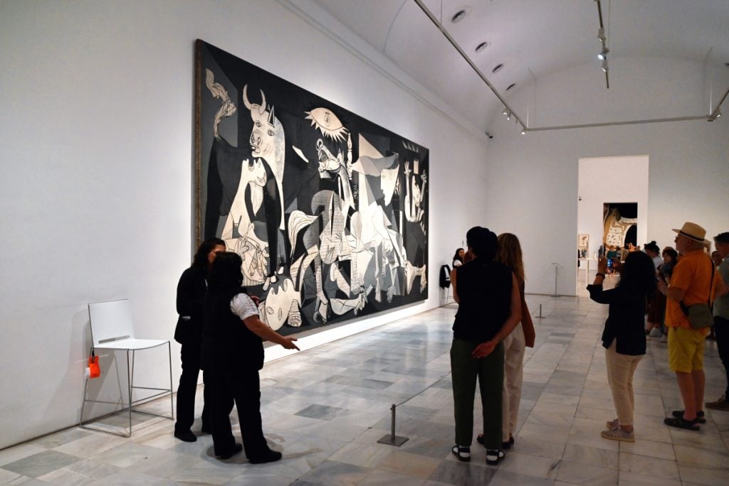 Visitors viewing Picasso’s Guernica at the Reina Sofía