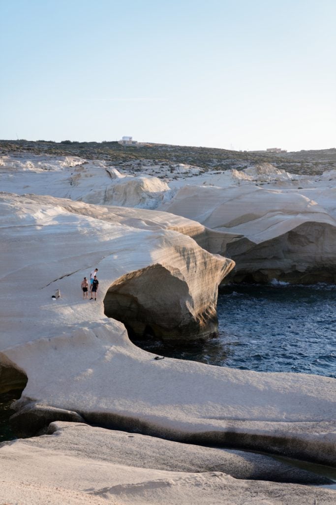 White volcanic cliffs and sea caves at Sarakiniko