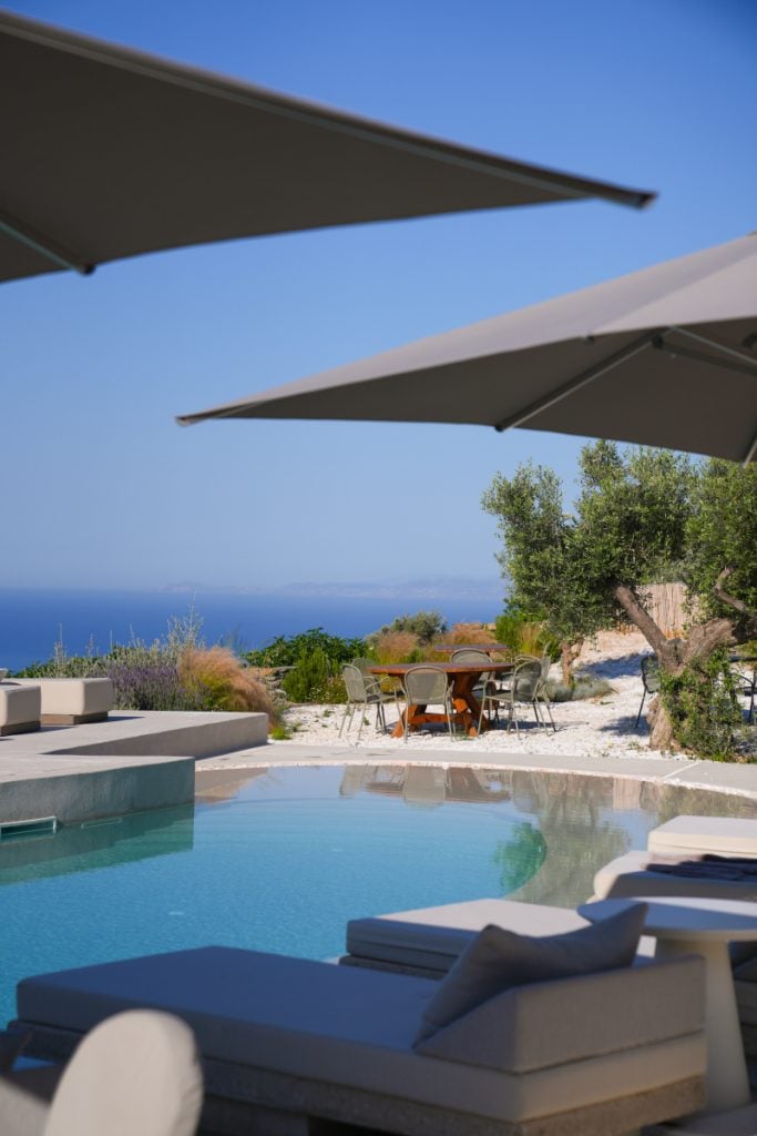 Pool terrace overlooking the sea at Stamna Hotel