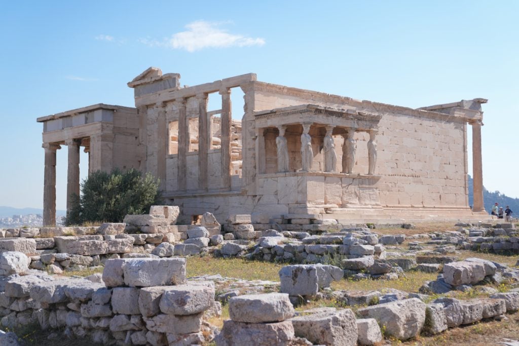 Erechtheion temple and stone ruins on the Acropolis