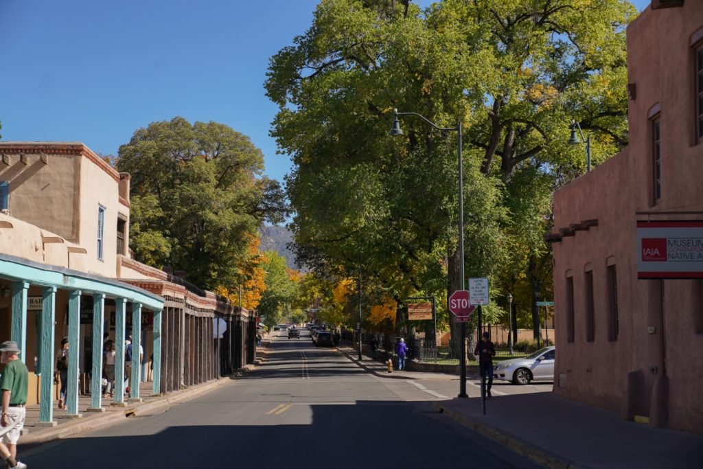 Tree-lined street in downtown Santa Fe near the Plaza
