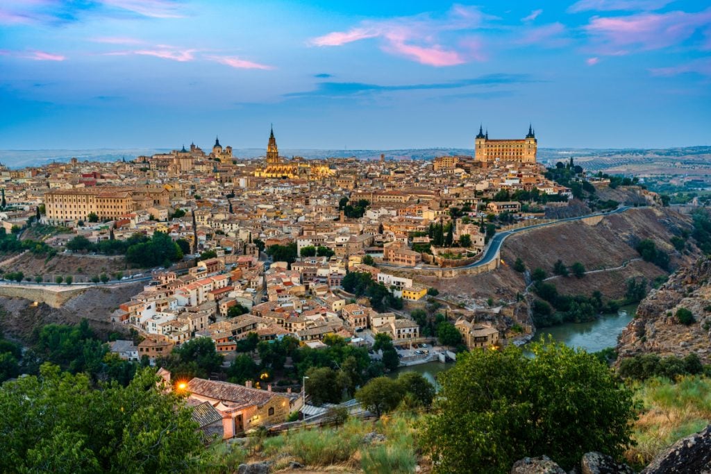 Toledo’s hilltop skyline above the river at dusk