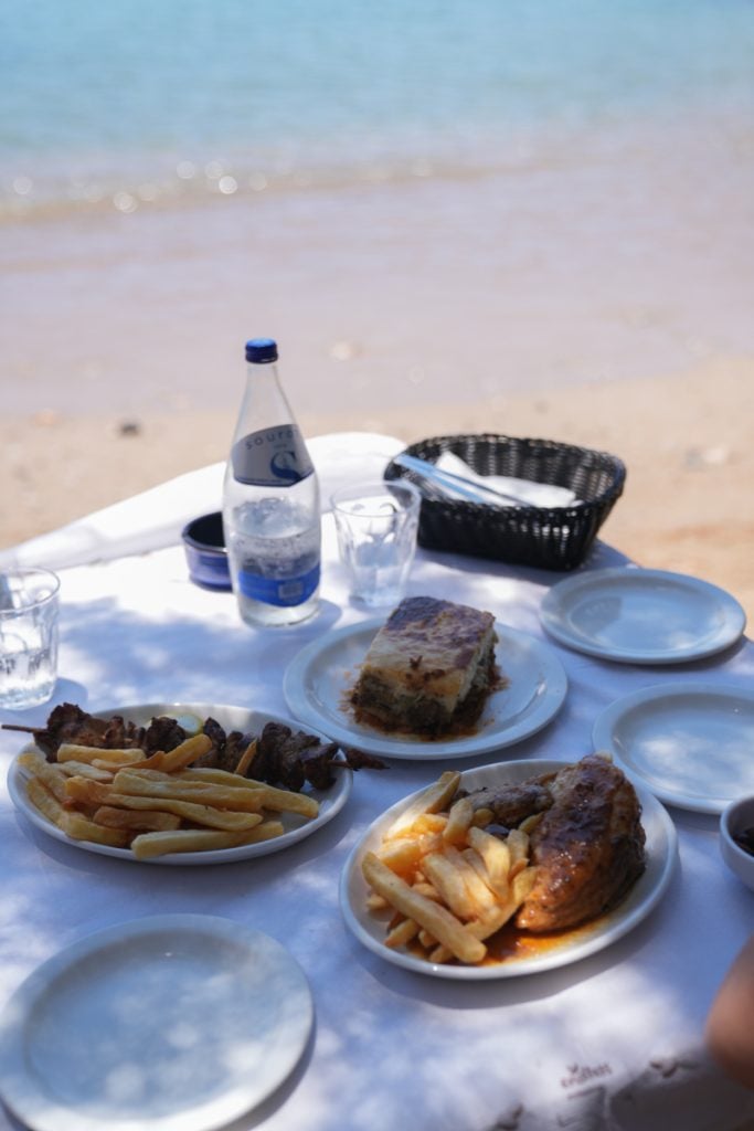 Moussaka, roast chicken, and fries at Tsikali