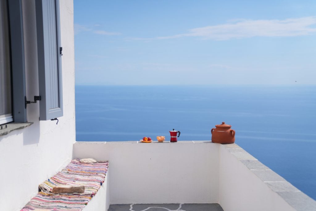 Sea view from a whitewashed terrace near Artemonas